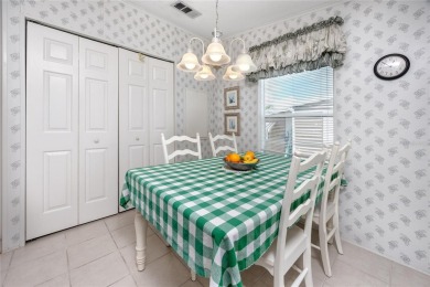 Florida Living at Its Finest in Sought-After Americana Cove - on Mangrove Bay Golf Course in Florida - for sale on GolfHomes.com, golf home, golf lot