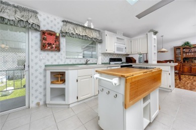 Florida Living at Its Finest in Sought-After Americana Cove - on Mangrove Bay Golf Course in Florida - for sale on GolfHomes.com, golf home, golf lot