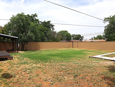 Updated 3 bedroom, 1 bathroom home only blocks from a golf on Sweetwater Country Club in Texas - for sale on GolfHomes.com, golf home, golf lot