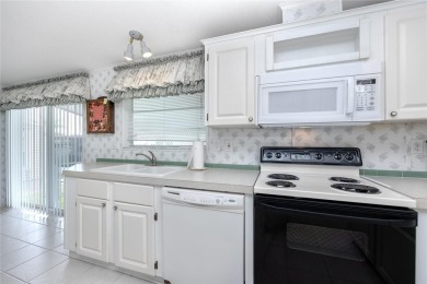 Florida Living at Its Finest in Sought-After Americana Cove - on Mangrove Bay Golf Course in Florida - for sale on GolfHomes.com, golf home, golf lot