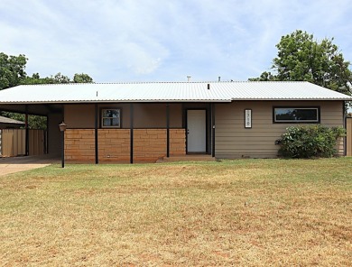Updated 3 bedroom, 1 bathroom home only blocks from a golf on Sweetwater Country Club in Texas - for sale on GolfHomes.com, golf home, golf lot