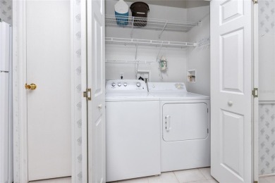 Florida Living at Its Finest in Sought-After Americana Cove - on Mangrove Bay Golf Course in Florida - for sale on GolfHomes.com, golf home, golf lot