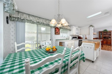 Florida Living at Its Finest in Sought-After Americana Cove - on Mangrove Bay Golf Course in Florida - for sale on GolfHomes.com, golf home, golf lot
