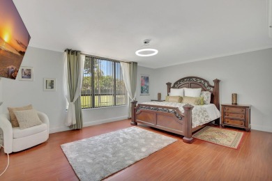 This stunning first-floor condo offers a spacious and modern on Boca Pointe Country Club in Florida - for sale on GolfHomes.com, golf home, golf lot