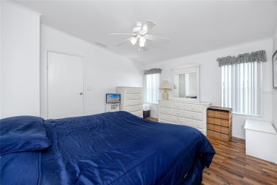 Florida Living at Its Finest in Sought-After Americana Cove - on Mangrove Bay Golf Course in Florida - for sale on GolfHomes.com, golf home, golf lot
