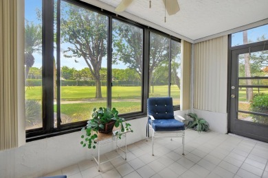 This stunning first-floor condo offers a spacious and modern on Boca Pointe Country Club in Florida - for sale on GolfHomes.com, golf home, golf lot