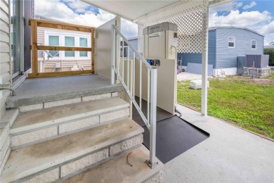 Florida Living at Its Finest in Sought-After Americana Cove - on Mangrove Bay Golf Course in Florida - for sale on GolfHomes.com, golf home, golf lot