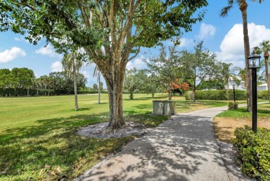 This stunning first-floor condo offers a spacious and modern on Boca Pointe Country Club in Florida - for sale on GolfHomes.com, golf home, golf lot