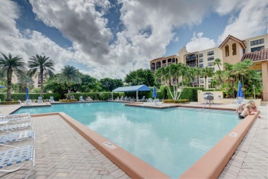 This stunning first-floor condo offers a spacious and modern on Boca Pointe Country Club in Florida - for sale on GolfHomes.com, golf home, golf lot