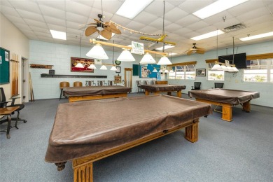 Florida Living at Its Finest in Sought-After Americana Cove - on Mangrove Bay Golf Course in Florida - for sale on GolfHomes.com, golf home, golf lot