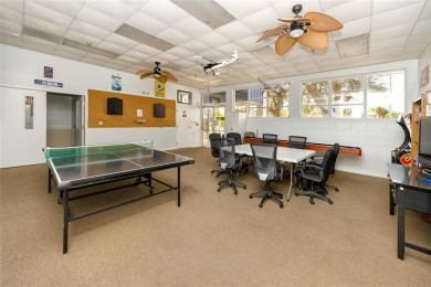 Florida Living at Its Finest in Sought-After Americana Cove - on Mangrove Bay Golf Course in Florida - for sale on GolfHomes.com, golf home, golf lot