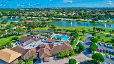 This stunning first-floor condo offers a spacious and modern on Boca Pointe Country Club in Florida - for sale on GolfHomes.com, golf home, golf lot