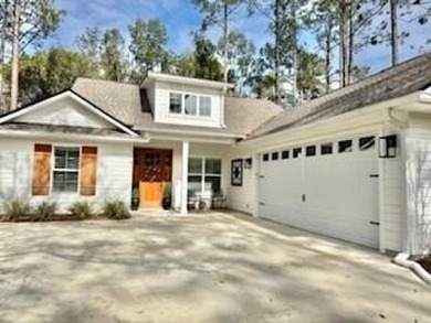 Immaculate Craftsman style home completed in 2022 by Bent Pine on The Club At Osprey Cove in Georgia - for sale on GolfHomes.com, golf home, golf lot