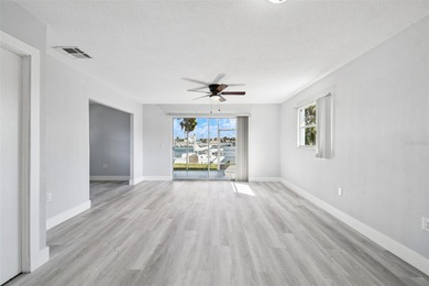 Live the Coastal Life in Gulf Harbors - Boater's Paradise! This on Gulf Harbors Golf Course in Florida - for sale on GolfHomes.com, golf home, golf lot