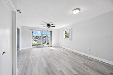 Live the Coastal Life in Gulf Harbors - Boater's Paradise! This on Gulf Harbors Golf Course in Florida - for sale on GolfHomes.com, golf home, golf lot