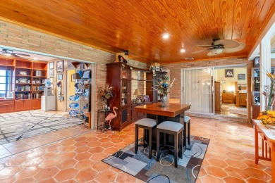 Located in the desirable city of Atlantis, this unique custom on Atlantis Golf Club in Florida - for sale on GolfHomes.com, golf home, golf lot