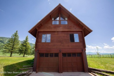 This charming Cedar log cabin is located on a scenic corner lot on Star Valley RV Golf Course in Wyoming - for sale on GolfHomes.com, golf home, golf lot