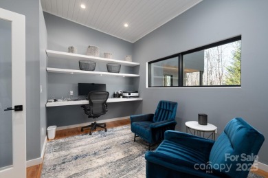 This contemporary masterpiece is nestled into one of North on Grove Park Golf and Country Club in North Carolina - for sale on GolfHomes.com, golf home, golf lot