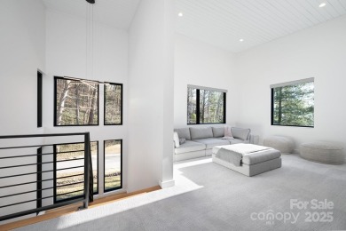 This contemporary masterpiece is nestled into one of North on Grove Park Golf and Country Club in North Carolina - for sale on GolfHomes.com, golf home, golf lot