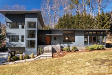 This contemporary masterpiece is nestled into one of North on Grove Park Golf and Country Club in North Carolina - for sale on GolfHomes.com, golf home, golf lot