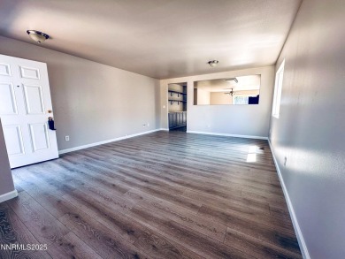 This 3 bedroom 2 bath home in the North Valleys has a spacious on Sierra Sage Golf Course in Nevada - for sale on GolfHomes.com, golf home, golf lot