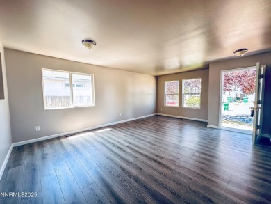 This 3 bedroom 2 bath home in the North Valleys has a spacious on Sierra Sage Golf Course in Nevada - for sale on GolfHomes.com, golf home, golf lot
