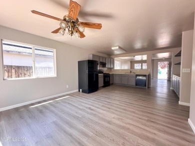 This 3 bedroom 2 bath home in the North Valleys has a spacious on Sierra Sage Golf Course in Nevada - for sale on GolfHomes.com, golf home, golf lot