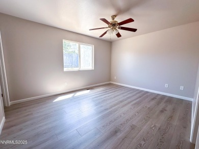 This 3 bedroom 2 bath home in the North Valleys has a spacious on Sierra Sage Golf Course in Nevada - for sale on GolfHomes.com, golf home, golf lot