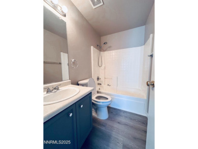 This 3 bedroom 2 bath home in the North Valleys has a spacious on Sierra Sage Golf Course in Nevada - for sale on GolfHomes.com, golf home, golf lot
