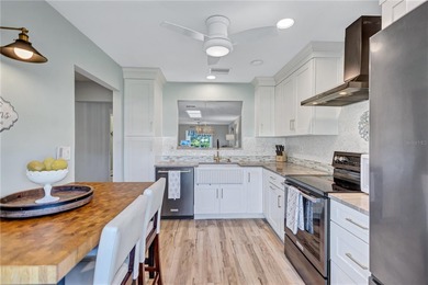 Welcome to this beautifully updated two-bedroom villa in highly on Highland Lakes Executive Golf Course in Florida - for sale on GolfHomes.com, golf home, golf lot