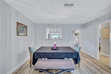 Welcome to this beautifully updated two-bedroom villa in highly on Highland Lakes Executive Golf Course in Florida - for sale on GolfHomes.com, golf home, golf lot