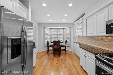 Experience timeless elegance at The Heathers, a prestigious on The Heathers Club in Michigan - for sale on GolfHomes.com, golf home, golf lot