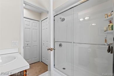 Experience timeless elegance at The Heathers, a prestigious on The Heathers Club in Michigan - for sale on GolfHomes.com, golf home, golf lot