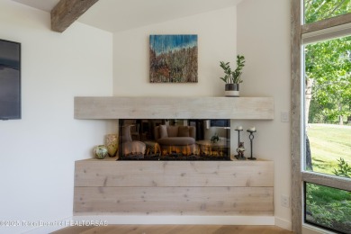 Experience refined mountain living in this beautifully remodeled on Jackson Hole Golf and Tennis Club in Wyoming - for sale on GolfHomes.com, golf home, golf lot