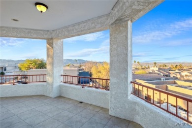 This home is on a quiet cul-de-sac at the edge of the Lake on London Bridge Golf Course in Arizona - for sale on GolfHomes.com, golf home, golf lot