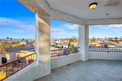 This home is on a quiet cul-de-sac at the edge of the Lake on London Bridge Golf Course in Arizona - for sale on GolfHomes.com, golf home, golf lot