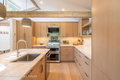 Experience refined mountain living in this beautifully remodeled on Jackson Hole Golf and Tennis Club in Wyoming - for sale on GolfHomes.com, golf home, golf lot