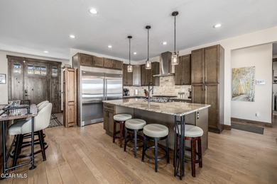 Welcome to your dream mountain retreat - a rare 6-bedroom on Headwaters Golf Course At Granby Ranch in Colorado - for sale on GolfHomes.com, golf home, golf lot