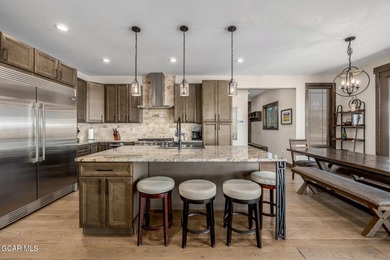 Welcome to your dream mountain retreat - a rare 6-bedroom on Headwaters Golf Course At Granby Ranch in Colorado - for sale on GolfHomes.com, golf home, golf lot