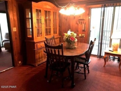 Tanglwood Lakes sprawling home situated on a level wooded lot on Paupack Hills Golf and Country Club in Pennsylvania - for sale on GolfHomes.com, golf home, golf lot