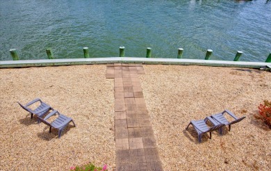 Spectacular Waterfront in Captain's Cove Golf & Yacht Club - and on Captains Cove Golf and Yacht Club in Virginia - for sale on GolfHomes.com, golf home, golf lot