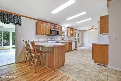 Three bedroom manufactured home with lake frontage on Lake on Lake Tansi Village Country Club in Tennessee - for sale on GolfHomes.com, golf home, golf lot