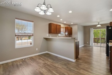 It is time to make this beautiful home yours!! Move-in ready on on Desert Hawk At Pueblo West in Colorado - for sale on GolfHomes.com, golf home, golf lot