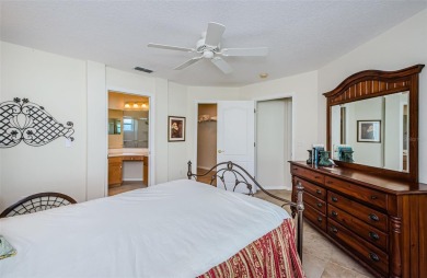 Welcome to this stunning 2-bedroom, plus a den, 2-bath home on Tampa Bay Golf and Country Club in Florida - for sale on GolfHomes.com, golf home, golf lot