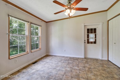 Three bedroom manufactured home with lake frontage on Lake on Lake Tansi Village Country Club in Tennessee - for sale on GolfHomes.com, golf home, golf lot