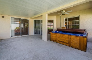 Welcome to this stunning 2-bedroom, plus a den, 2-bath home on Tampa Bay Golf and Country Club in Florida - for sale on GolfHomes.com, golf home, golf lot