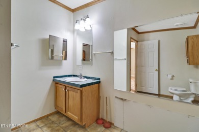 Three bedroom manufactured home with lake frontage on Lake on Lake Tansi Village Country Club in Tennessee - for sale on GolfHomes.com, golf home, golf lot