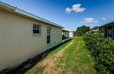 Welcome to this stunning 2-bedroom, plus a den, 2-bath home on Tampa Bay Golf and Country Club in Florida - for sale on GolfHomes.com, golf home, golf lot