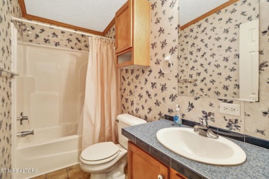 Three bedroom manufactured home with lake frontage on Lake on Lake Tansi Village Country Club in Tennessee - for sale on GolfHomes.com, golf home, golf lot