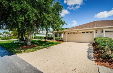 Welcome to this stunning 2-bedroom, plus a den, 2-bath home on Tampa Bay Golf and Country Club in Florida - for sale on GolfHomes.com, golf home, golf lot